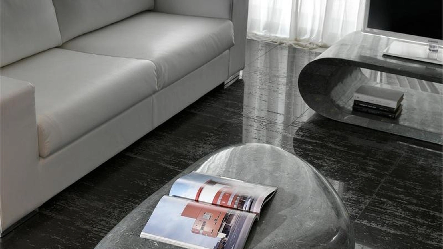 Tavolino Sasso Big in pietra fossile di Stones