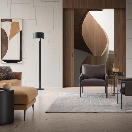 Poltroncina Andy in ecopelle con struttura in metallo di Le Comfort