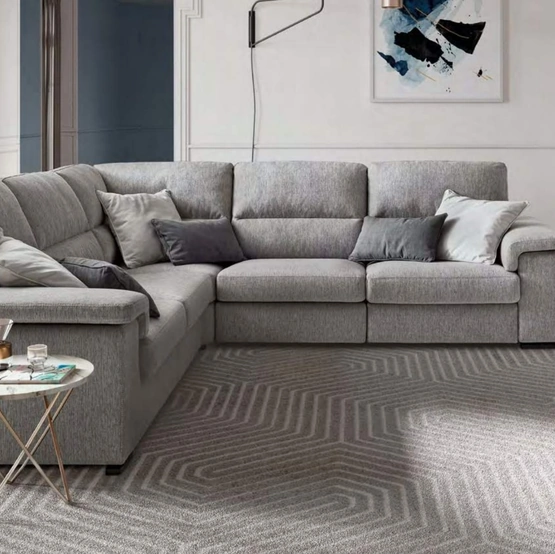 Divano angolare in tessuto con movimento relax Jaro di Le Comfort