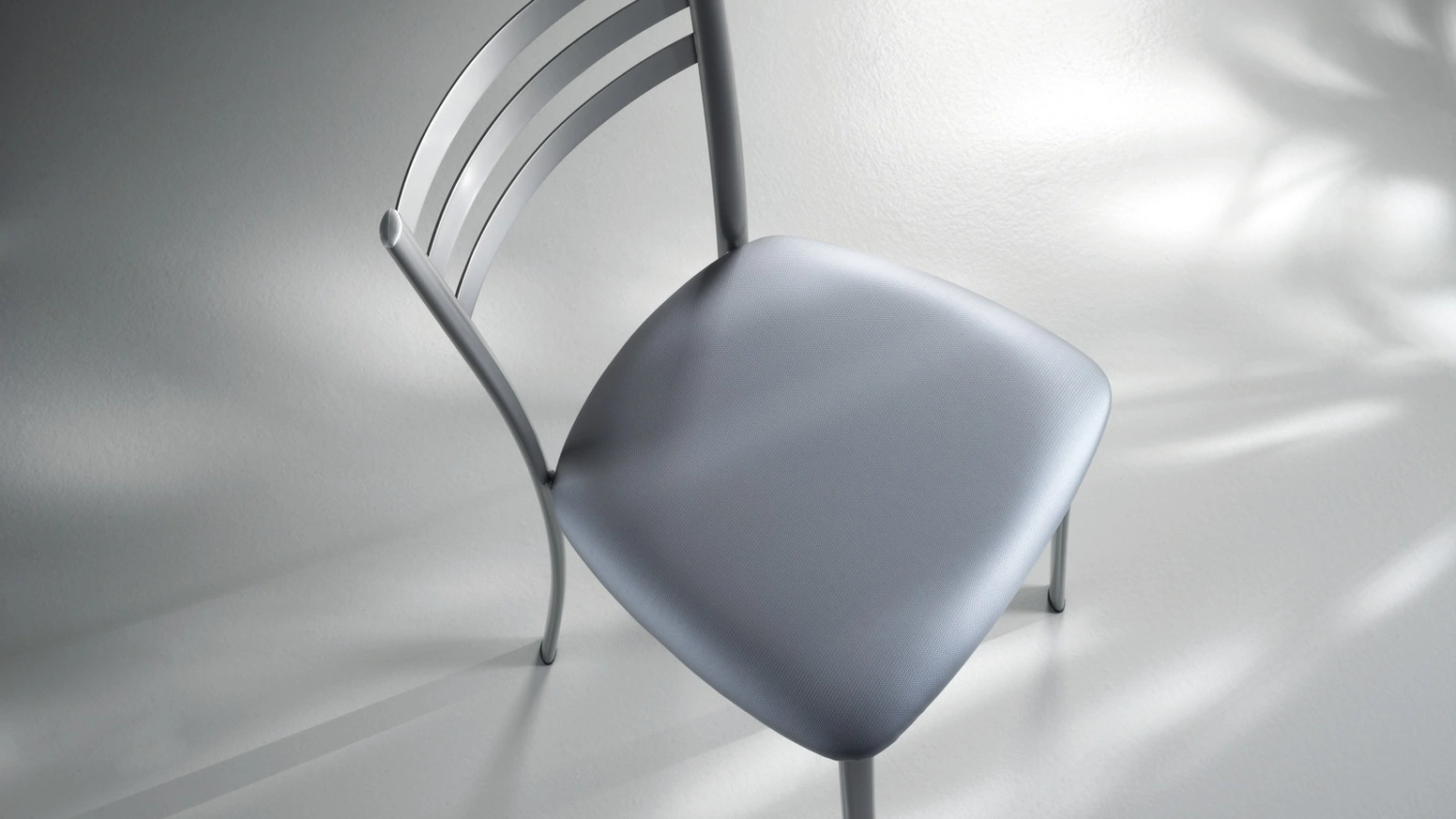 Sedia Speedy in metallo con seduta in tessuto imbottito di Scavolini