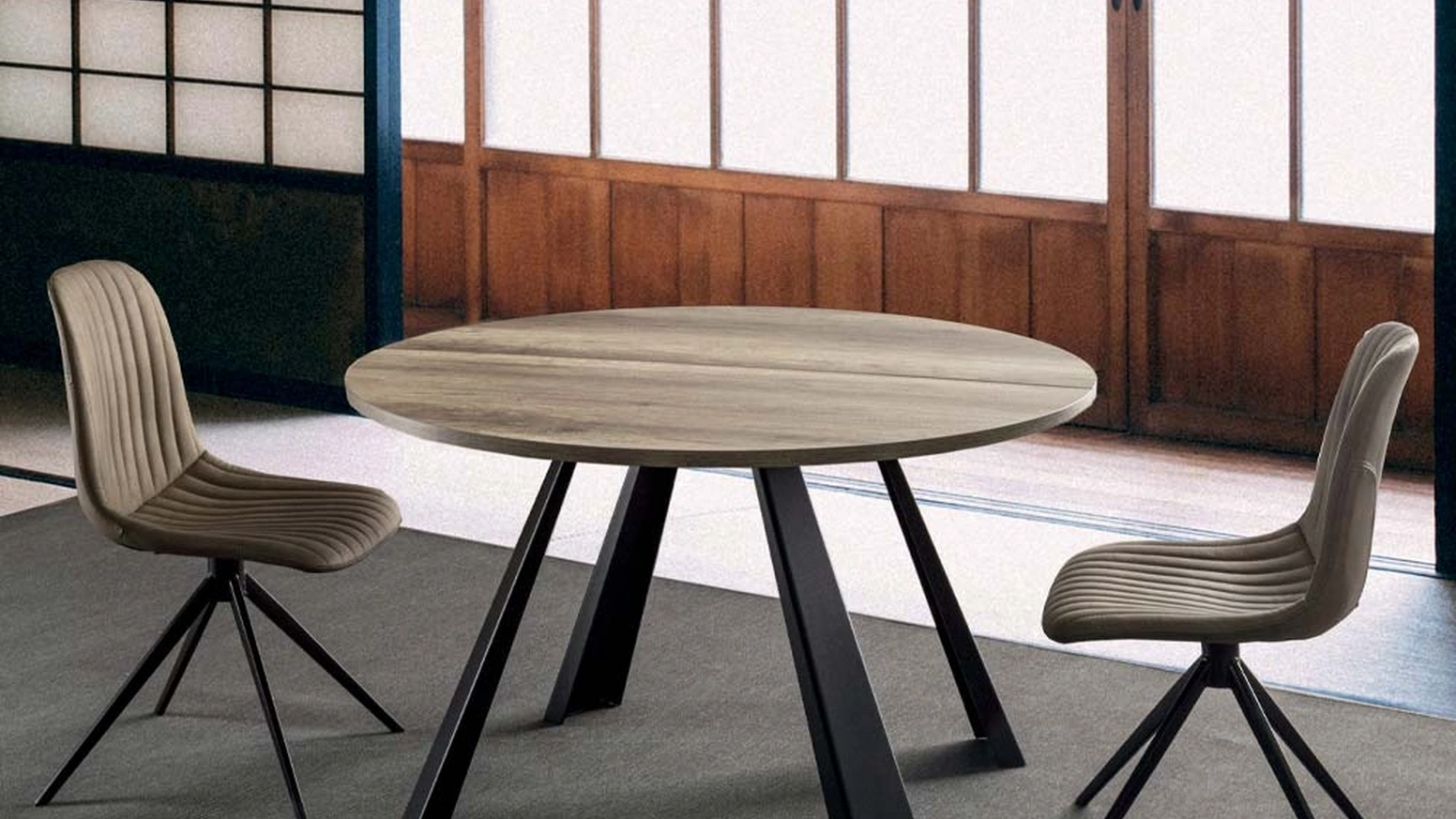 Tavolo rotondo allungabile Saturn-INO in nobilitato rovere nodato con struttura in metallo verniciato nero di La Seggiola