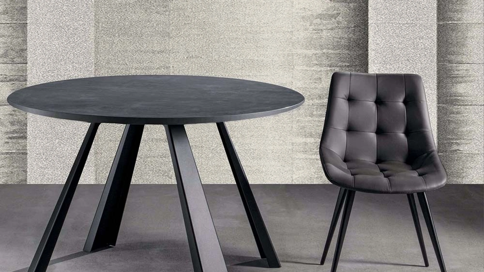 Tavolo rotondo allungabile in nobilitato antracite con gambe in metallo verniciato nero Saturn-ONE di La Seggiola